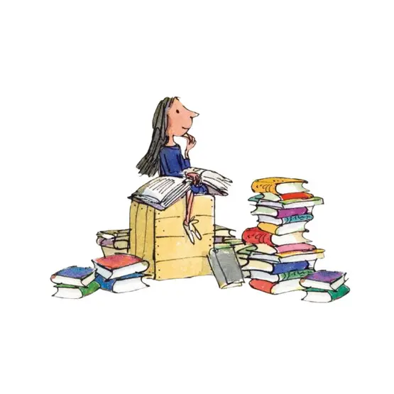 niña con muchos libros al rededor